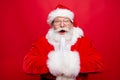 Reaction emotions concept. Impressed aged stylish Santa in spect Royalty Free Stock Photo