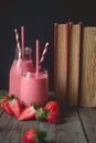 After read the book relax time with strawberry smoothie with wo Royalty Free Stock Photo