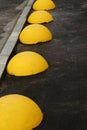 Read car sign on a gray concrete pedestrian sidewalk - a few hemispheres. Royalty Free Stock Photo