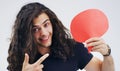 Read the following statement. Portrait of a handsome young man holding a speech bubble against a grey background. Royalty Free Stock Photo