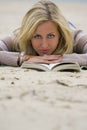 Reading on the Beach Royalty Free Stock Photo