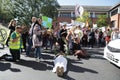 Reading, Berkshire / UK - September 20th 2019: Reading Climate Strike. Woman lays down on the road in Bridge Street in front of