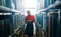 Young librarian reading a book Royalty Free Stock Photo