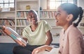 Reading books, african children or friends learning, education and creative storytelling in library group. Happy Royalty Free Stock Photo