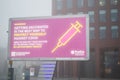 READING, ENGLAND- 15 January 2022: Reading Borough Council billboard encouraging people to get vaccinated