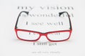 Reading eyeglasses and eye chart Royalty Free Stock Photo