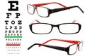 Reading glasses with eye chart Royalty Free Stock Photo