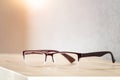 reading glasses on a wooden table Royalty Free Stock Photo