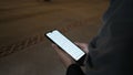 Reading holly book at mosque, Young Muslim woman reading quran smarthphone