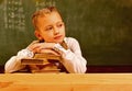 Reading. reading lesson for small kid. little girl reading book. reading at school in boring, copy space. Royalty Free Stock Photo