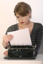 Reading letter on typewriter Royalty Free Stock Photo