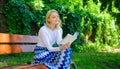 Reading literature as hobby. Woman blonde take break relaxing in park reading book. Ultimate best book list. Girl keen