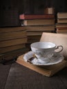 Reading with Old Books and Tea Cup Royalty Free Stock Photo