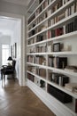 Reading place with wooden floor,bookshelves, white wall Royalty Free Stock Photo