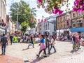 READING, UK - 16 September 2023: Friar Street with people and market.