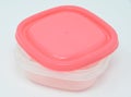 Pink lidded tupperware box Royalty Free Stock Photo