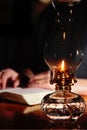 Reading By Vintage Lamplight Royalty Free Stock Photo