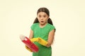 Reading washing instruction for using household cleaning product. Small child holding laundry detergent. Cute cleaner