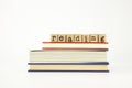 Reading word on wood stamps and books Royalty Free Stock Photo