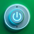 Illuminated Power Button Ready to Start on Green Background Royalty Free Stock Photo