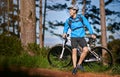 Ready for any challenge. a male cyclist out for a ride on his mountain bike. Royalty Free Stock Photo