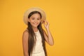 ready for beach party. holiday mood. small girl on vacation. rancho child in straw hat. little cutie on yellow