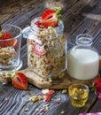 Ready-made granola with dried strawberries and almonds. Healthy breakfast cereal muesli, fresh Royalty Free Stock Photo