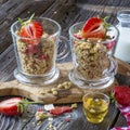 Ready-made granola with dried strawberries and almonds. Healthy breakfast cereal muesli, fresh Royalty Free Stock Photo