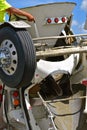 Cleaning the chute of a ready-mix truck Royalty Free Stock Photo