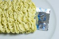 Ready noodles in 3 minutes. A photo was taken in the kitchen, curled and in a plate