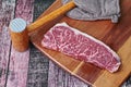 Ready raw fresh steak as wagyu beef  MS5+ with meat hammer and  butter Royalty Free Stock Photo