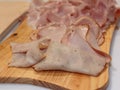 Ready-sliced Ham Steak and Seasoned Cold Cuts on Wooden Board