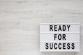 `Ready for success` words on a modern board on a white wooden background, top view. Overhead, from above, flat lay. Space for te Royalty Free Stock Photo