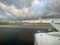 Ready for takeoff at the airport on a bad weather rainy day. Royalty Free Stock Photo