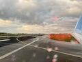 Ready for takeoff at the airport on a bad weather rainy day. Royalty Free Stock Photo