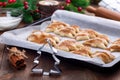 Ready to bake Christmas tree shaped puff pastry cookies with sugar and cinnamon, cookie cutter Royalty Free Stock Photo