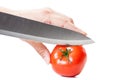 Ready to cut a red tomato with the knife Royalty Free Stock Photo