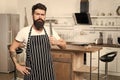 Ready to cut. serious and confident chef in cafe use knife. tasty cuisine. bearded man hipster in kitchen. brutal man in Royalty Free Stock Photo