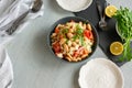 Ready to eat beans salad, healthy protein rich meal with fresh arugula and lemon Royalty Free Stock Photo