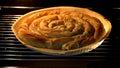 Ready to eat Turkish pastry `Borek` with spinach in an oven Royalty Free Stock Photo