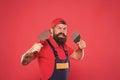 Ready to fight. angry man wear engineer uniform. nature bearded worker hold spatula. repair tools and equipment