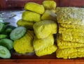 Ready to fried Tofu and tempeh with cucumber for side dish at a food stall Royalty Free Stock Photo