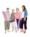 Ready to head for their lamaze class. Pregnant friends standing together and holding their yoga mats while isolated on Royalty Free Stock Photo