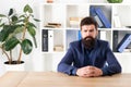 Ready to hear your opinion. Report and complaint concept. Man bearded hipster boss looking at you with attention. Boss Royalty Free Stock Photo