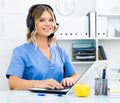 Ready to help specialist medical call center in headphones with microphone