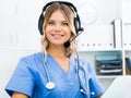 Ready to help specialist medical call center in headphones with microphone