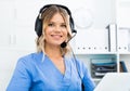 Ready to help specialist medical call center in headphones with microphone