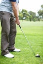 Ready to kickstart his game. Cropped view of a man playing golf on the course.