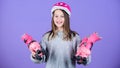 Ready to roller skating. Girl cute teen wear helmet and roller skates on violet background. Active leisure and lifestyle Royalty Free Stock Photo