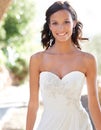 Ready to walk down the aisle. Waist up portrait of a radiant bride. Royalty Free Stock Photo